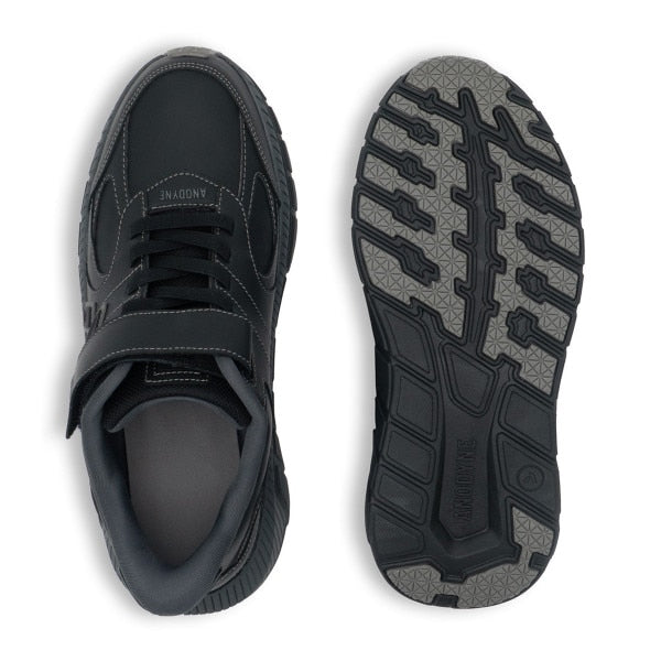 Rear view of the Anodyne No. 38 Casual Comfort shoe in black, highlighting the padded heel collar and sleek leather upper designed for all-day orthopedic comfort.