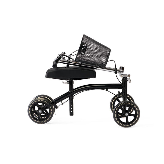 Side view of the Medline Generation 4 knee walker in a folded position, showing compact design with padded knee rest, basket, and four wheels for transport and storage.