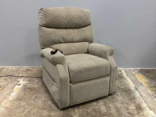 Front view of a used Pride CL20 lift chair in the upright seated position, highlighting the cushioned seat, supportive backrest, and compact home-friendly design.