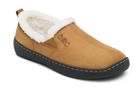 Side view of the Dr. Comfort Men's Vista Slipper in Camel, showing its soft suede-like exterior