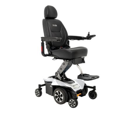 Mid-size power wheelchair in pearl white with black padded seat, adjustable armrests, and joystick control—available at Dahl Medical Supply for comfort and maneuverability.