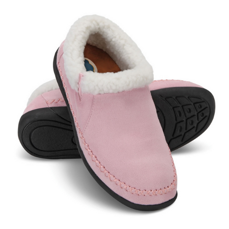 Pair of pink women’s diabetic slippers with soft white fleece lining and non-slip soles, designed for warmth, comfort, and foot protection from Dahl Medical Supply.