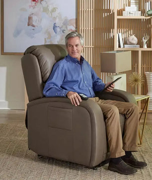 man sits in brown lift chair rental