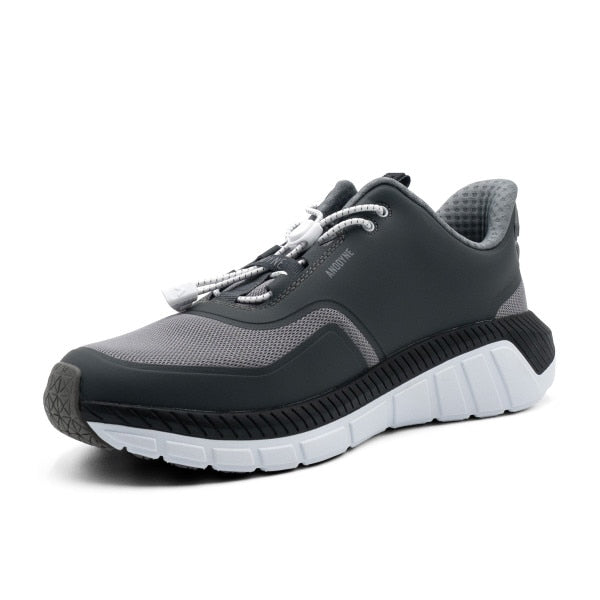 Bottom view of the Anodyne No. 22 Trail Walker in grey and black, showcasing its slip-resistant, textured sole designed for enhanced traction and orthopedic stability.