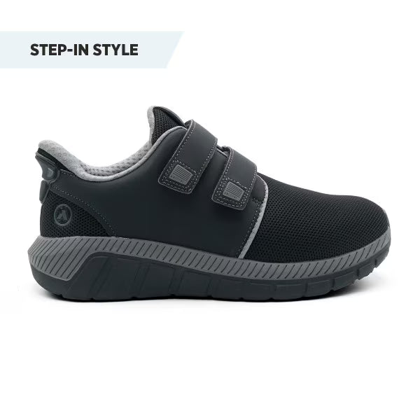 Side profile of the Anodyne No. 24 Sport Move in black and grey, featuring a slip-resistant sole, breathable mesh upper, and easy step-in entry design.