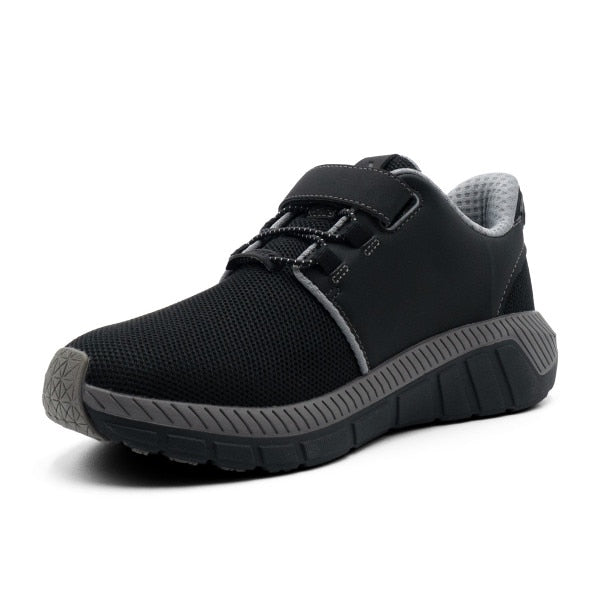 Rear and sole view of the Anodyne No. 46 Sport Jogger in black and grey, highlighting the cushioned heel and supportive outsole ideal for diabetic foot care
