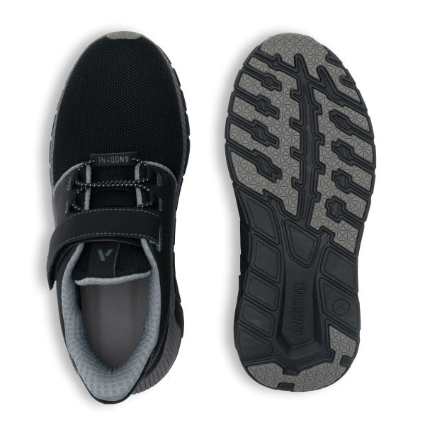 Bottom view of the Anodyne No. 46 Sport Jogger in black and grey, showing the durable, non-slip outsole designed for stability and diabetic safety