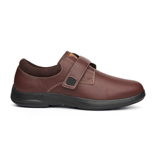 Side view of the Anodyne No. 64 Casual Shoe in whiskey brown, featuring a seamless leather upper, adjustable Velcro strap, and black cushioned sole, designed for diabetic foot care.