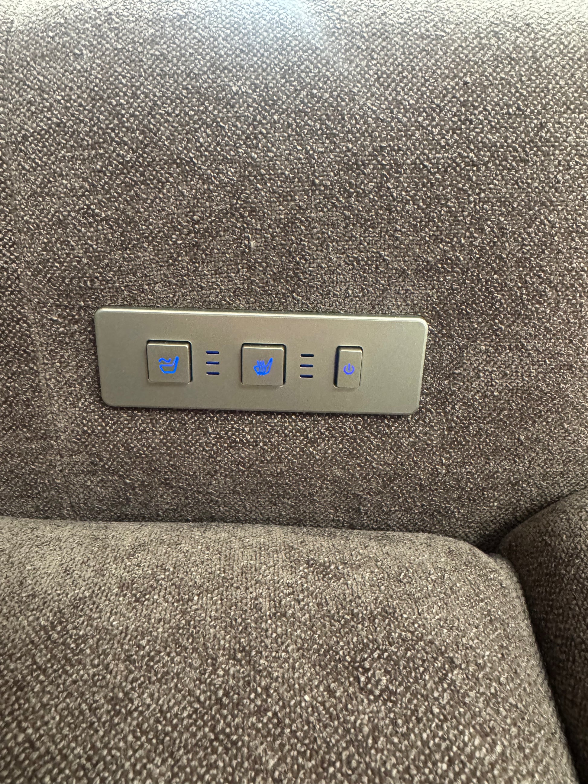Close-up of the illuminated control panel on a used Golden PR-4955 Medium Lift Chair in Trento Brown