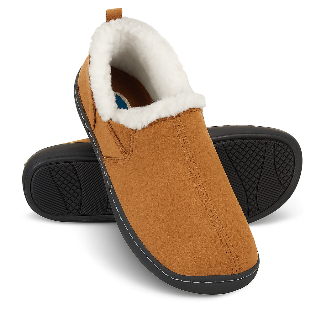 A front and bottom view of the Dr. Comfort Men's Vista slipper in camel tan. Featuring a cozy fleece lining, soft suede-like upper, and durable black outsole with textured grip, this slip-on is designed for all-day indoor and outdoor comfort, ideal for diabetic or sensitive feet.