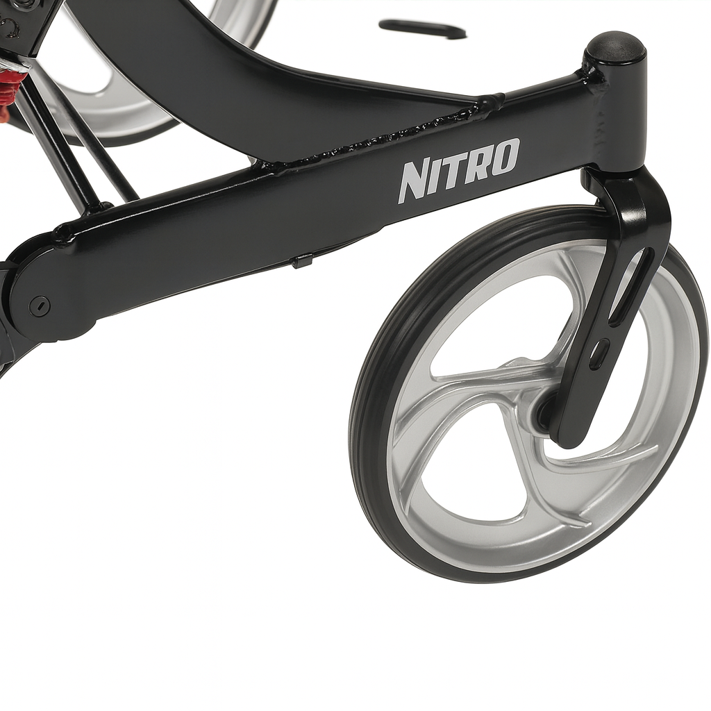 Close-up of the Drive Nitro Rollator showing the black aluminum frame with bold Nitro branding, large three-spoke silver wheel, and durable rubber tire for smooth mobility.