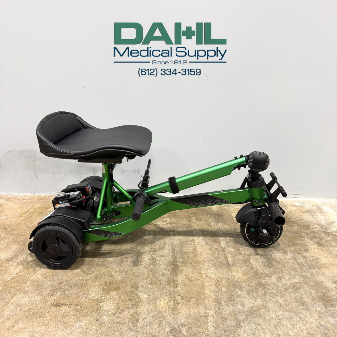 Used Drive iRIDE S25 3-wheel mobility scooter shown in folded position, demonstrating compact design for storage and travel.