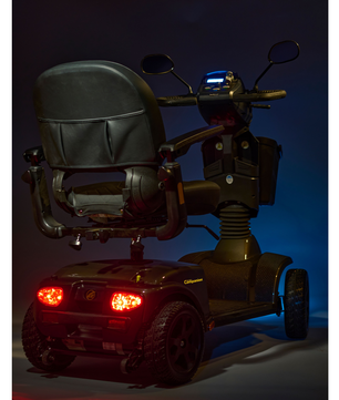 Galactic Gray Golden Companion 4-wheel Full Size Scooter with head lights on