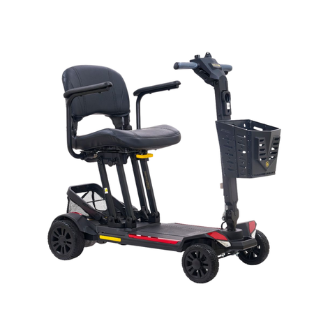 Side view of the Golden Buzzaround CarryOn GB120 folding travel mobility scooter, featuring a padded black seat with armrests, front storage basket, compact frame, and four wheels designed for portability and travel.