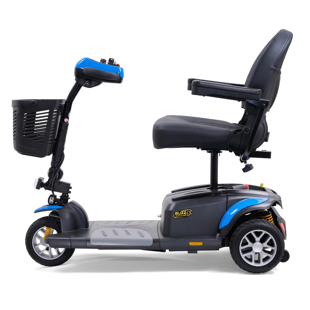 Opposite side view of the Golden Buzzaround EX 3-wheel mobility scooter with padded seat, armrests, front basket, and three-wheel base