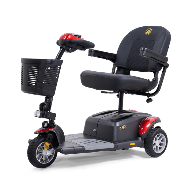 Golden Buzzaround EX 3-wheel mobility scooter with red accents, padded seat, armrests, front basket, and compact three-wheel design