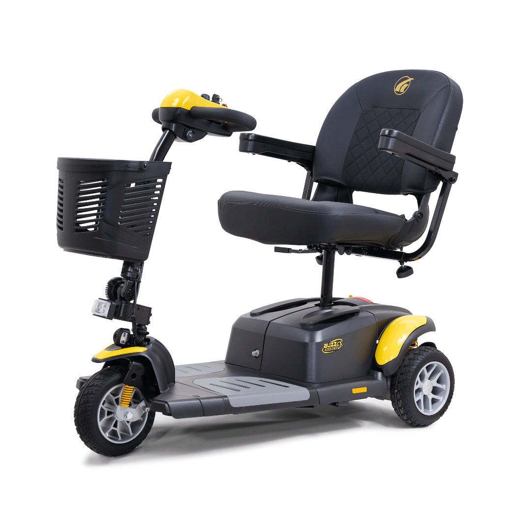 Golden Buzzaround EX 3-wheel mobility scooter with yellow accents, padded seat, armrests, front basket, and compact three-wheel design