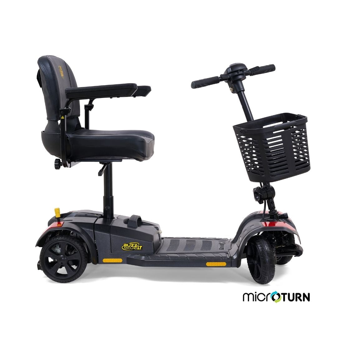 Side view of the Golden Buzzaround LT 4-wheel mobility scooter showing low step-through deck, seat with armrests, and front basket.