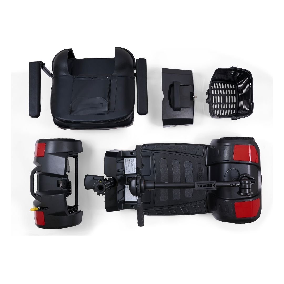 Disassembled components of the Golden Buzzaround LT mobility scooter including seat, basket, battery pack, and front and rear sections.