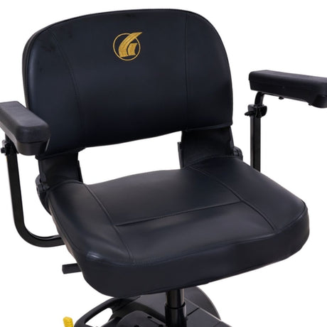 Close-up of the Golden Buzzaround LT scooter seat with cushioned padding, armrests, and backrest for everyday comfort.