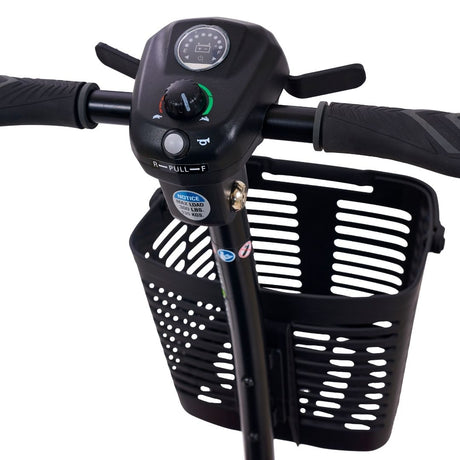 Close-up of the Golden Buzzaround LT mobility scooter tiller showing speed control knob, battery indicator, ergonomic hand grips, and front storage basket.