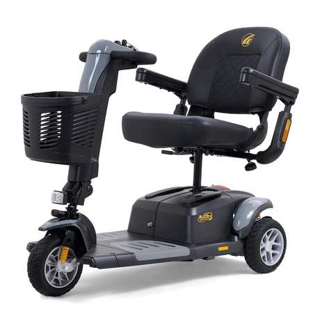 Gray Golden Buzzaround LX 3-wheel mobility scooter shown with padded seating, armrests, front basket, and stable three-wheel configuration.