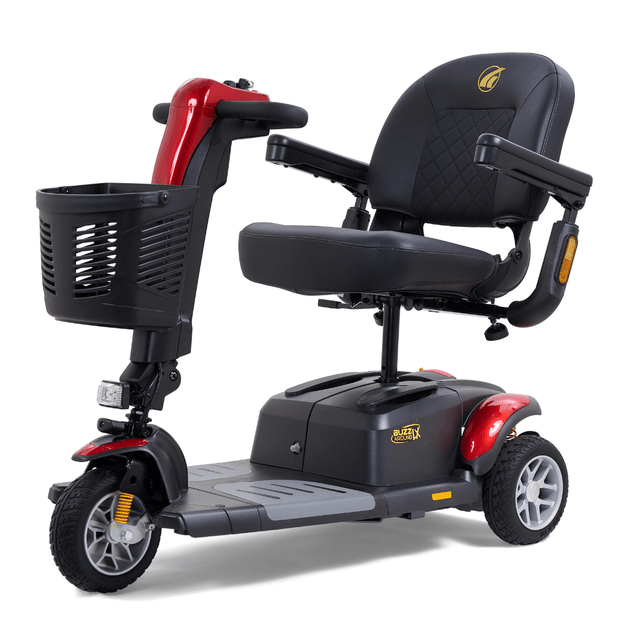 Red Golden Buzzaround LX 3-wheel mobility scooter featuring a cushioned seat, adjustable armrests, front storage basket, and three-wheel frame.