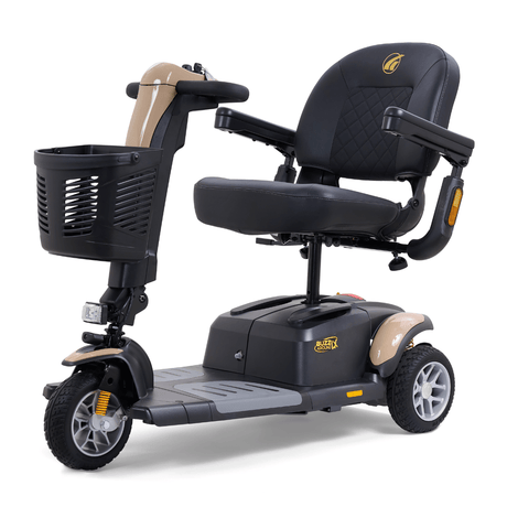 Tan Golden Buzzaround LX 3-wheel mobility scooter featuring padded seating, armrests, front basket, and three-wheel mobility design.