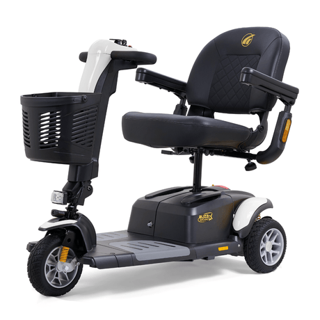 White Golden Buzzaround LX 3-wheel mobility scooter with contoured seat, armrests, front basket, and compact maneuverable design.