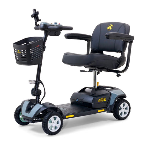 Golden Buzzaround XL 4-wheel mobility scooter shown with padded seat, armrests, front basket, and gray accent panels.