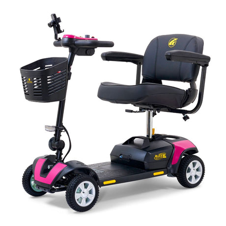 Golden Buzzaround XL 4-wheel mobility scooter featuring padded seating, armrests, front basket, and pink accent panels.