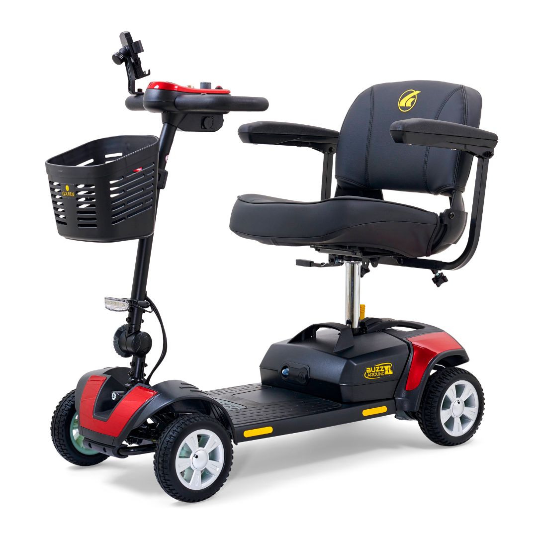 Golden Buzzaround XL 4-wheel mobility scooter with padded stadium-style seat, armrests, front basket, and red accent panels.