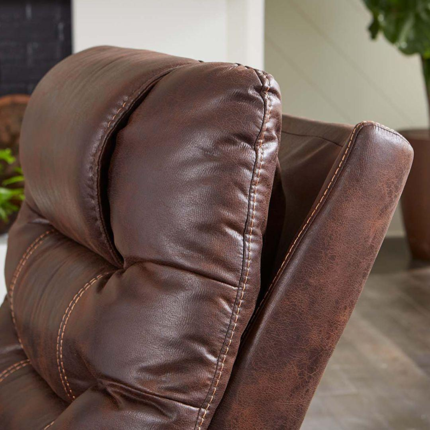 Close-up of the Golden Dione PR446 Lift Chair articulating headrest in maple faux leather at Dahl Medical Supply Burnsville MN