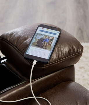 Close-up of Golden PR442 lift chair arm showing built-in USB charging port and storage compartment.