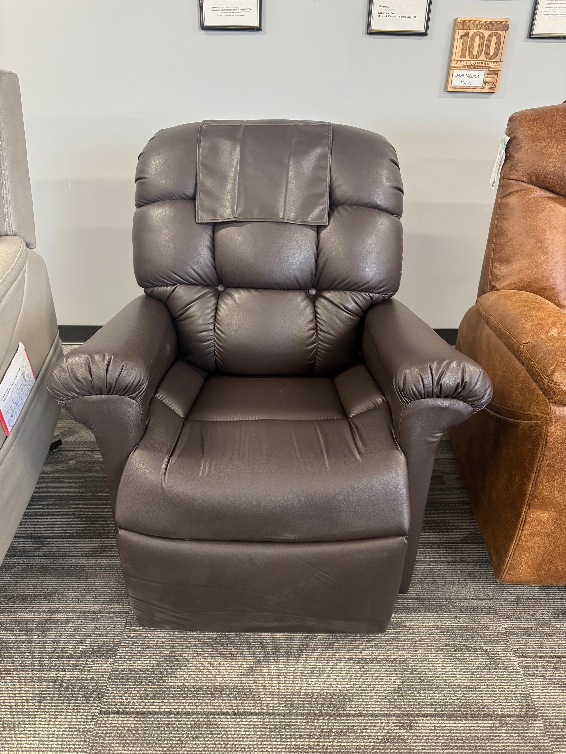 Golden Technologies PR510-SME Cloud Lift Chair in rich Coffee Bean leather, displayed at Dahl Medical Supply showroom in Minnesota.