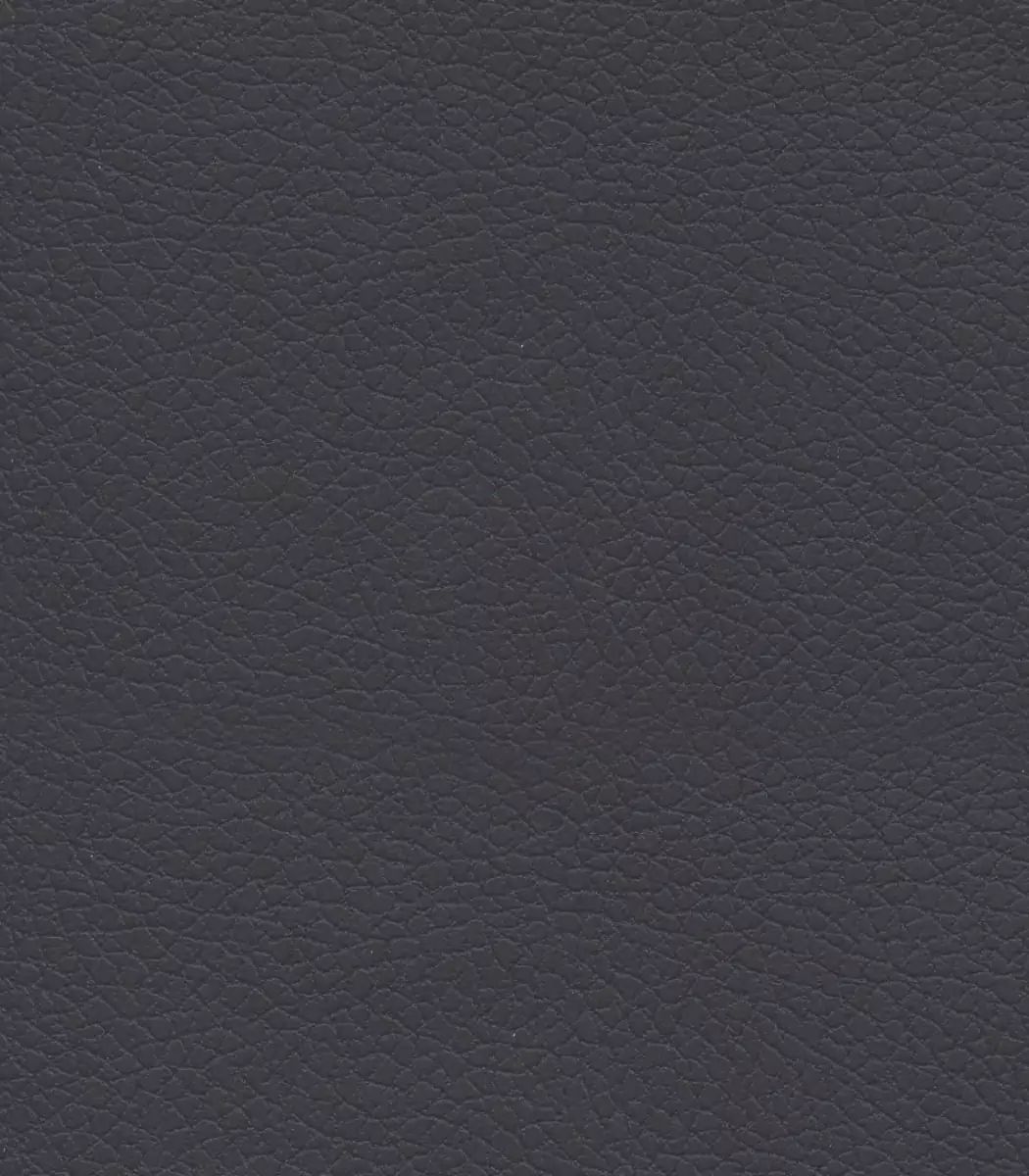 Close-up image of the Black Onyx UBO Brisa fabric option for the Golden PR535 Comforter Lift Chair, showcasing a deep black tone with a refined, leather-like texture that offers durability, sophistication, and easy cleaning.