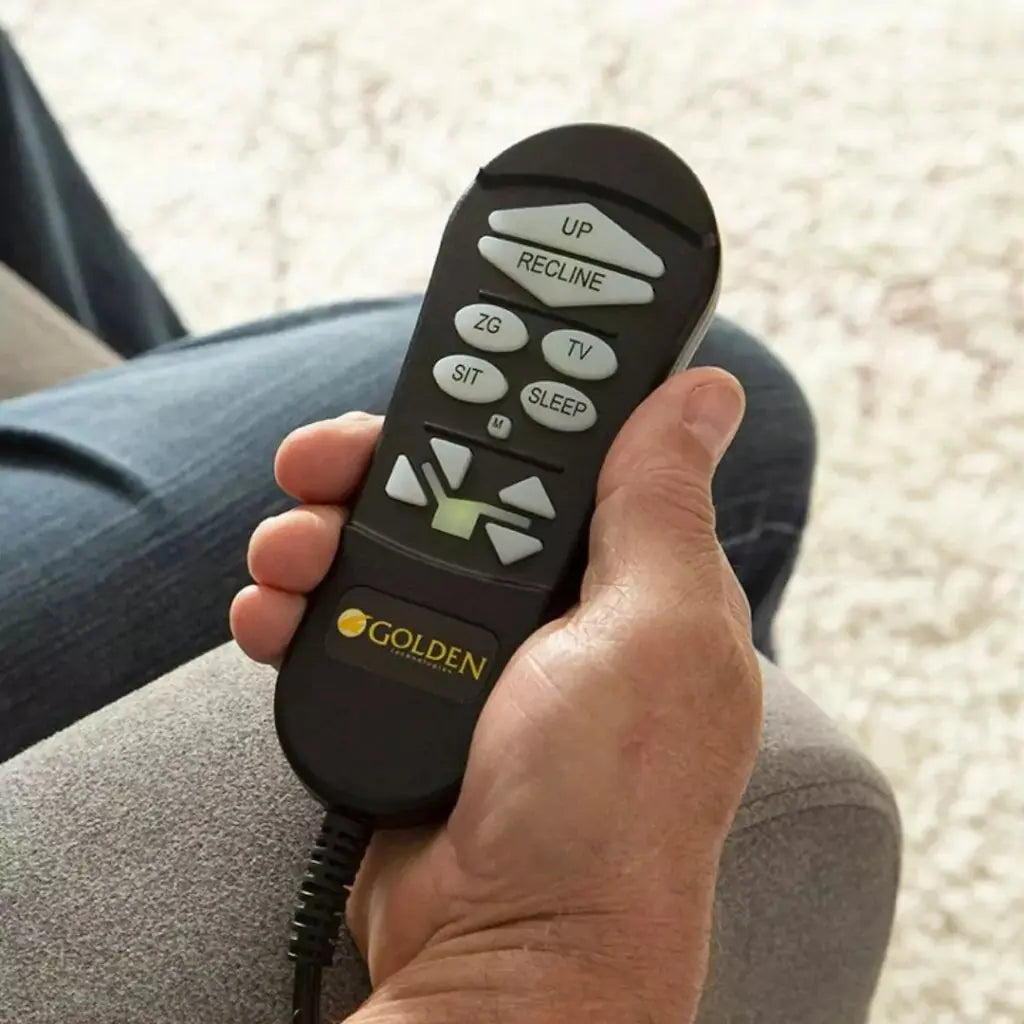 Close-up of the handheld remote control for the Golden PR763 Infinite Position Lift Chair, available at Dahl Medical Supply in Burnsville, Minnesota. The easy-to-use remote features preset buttons for sit, sleep, TV, and zero-gravity positions for customizable comfort.