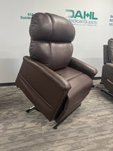 Golden Technologies PR531-T28 Tall/Wide Lift Chair in rich Coffee Bean upholstery displayed in the Dahl Medical Supply showroom, featuring plush overstuffed cushions and full lift position for tall and broad users.
