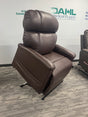 Golden Technologies PR531-T28 Tall/Wide Lift Chair in rich Coffee Bean upholstery displayed in the Dahl Medical Supply showroom, featuring plush overstuffed cushions and full lift position for tall and broad users.