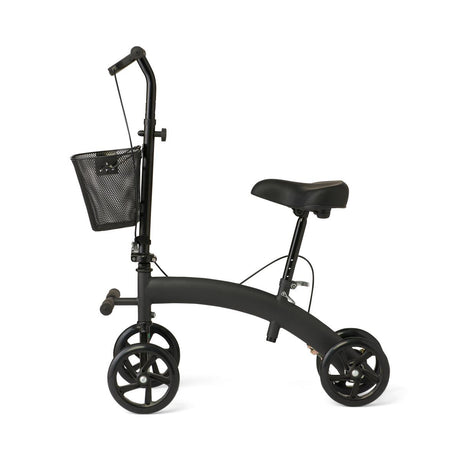Side view of the Medline seated knee walker in black, featuring a padded seat, four wheels, adjustable handlebars, and front mesh basket for storage.