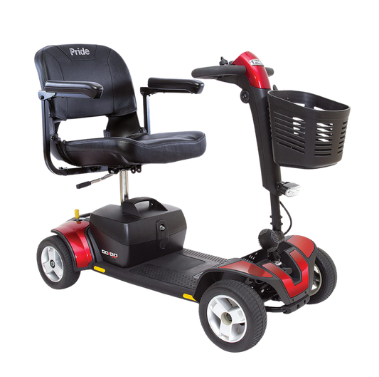 A profile view of a red Pride Go Go Sport 4-wheel mobility scooter against a black background. This model includes interchangeable red shroud panels, a compact foldable seat, a front basket, and a delta tiller with an integrated charging port.