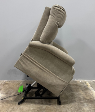 Side view of a used Pride CL20 power lift chair in the fully raised lift position, showing the chair assisting with standing and the sturdy lift mechanism underneath.