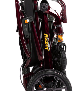Pride Jazzy Carbon HD power wheelchair shown folded for transport