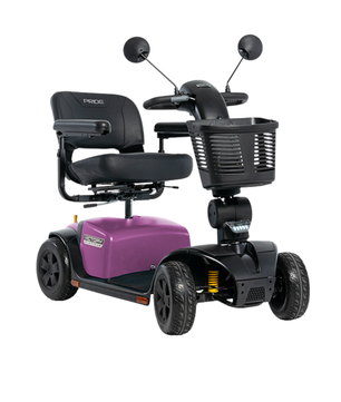 Pride Victory Platinum mobility scooter in Sugar Plum purple with wide comfortable seating, front storage basket, and stable 4-wheel design.
