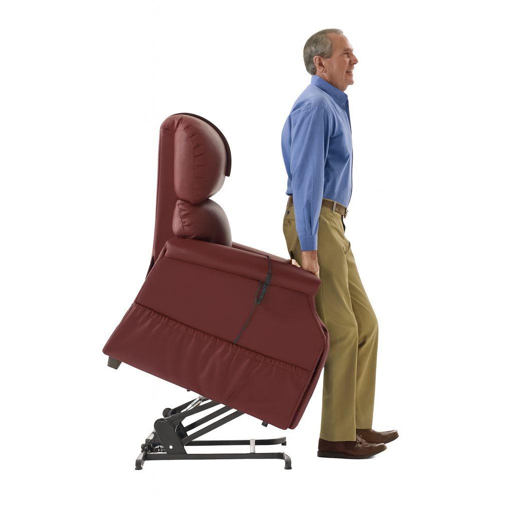 Man using a red reclining lift chair that tilts forward to assist him in standing, showing the safety and comfort features available with Dahl Medical Supply’s lift chair rentals.