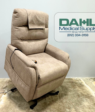 Front view of a very lightly used Golden PR118 power lift chair with padded armrests, supportive backrest, and easy-to-use hand control. Available from Dahl Medical Supply with local Twin Cities delivery.