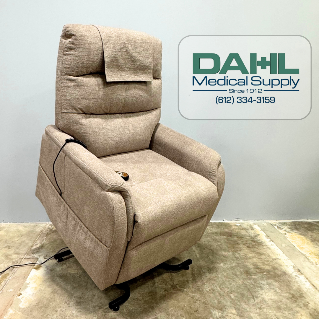 Front view of a very lightly used Golden PR118 power lift chair with padded armrests, supportive backrest, and easy-to-use hand control. Available from Dahl Medical Supply with local Twin Cities delivery.