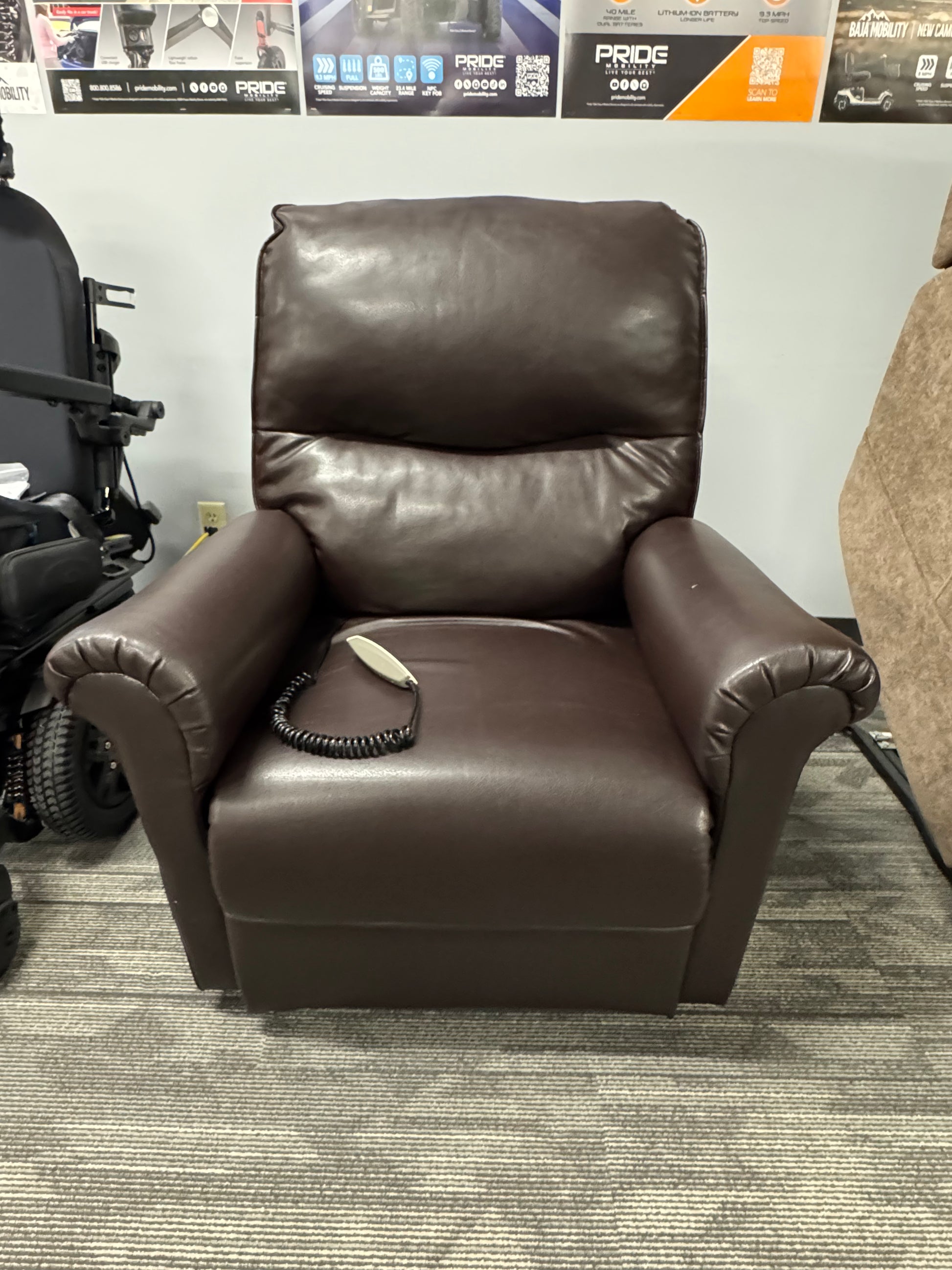 Used Pride LC-105 3-Position Lift Chair in dark brown vinyl upholstery at Dahl Medical, Burnsville