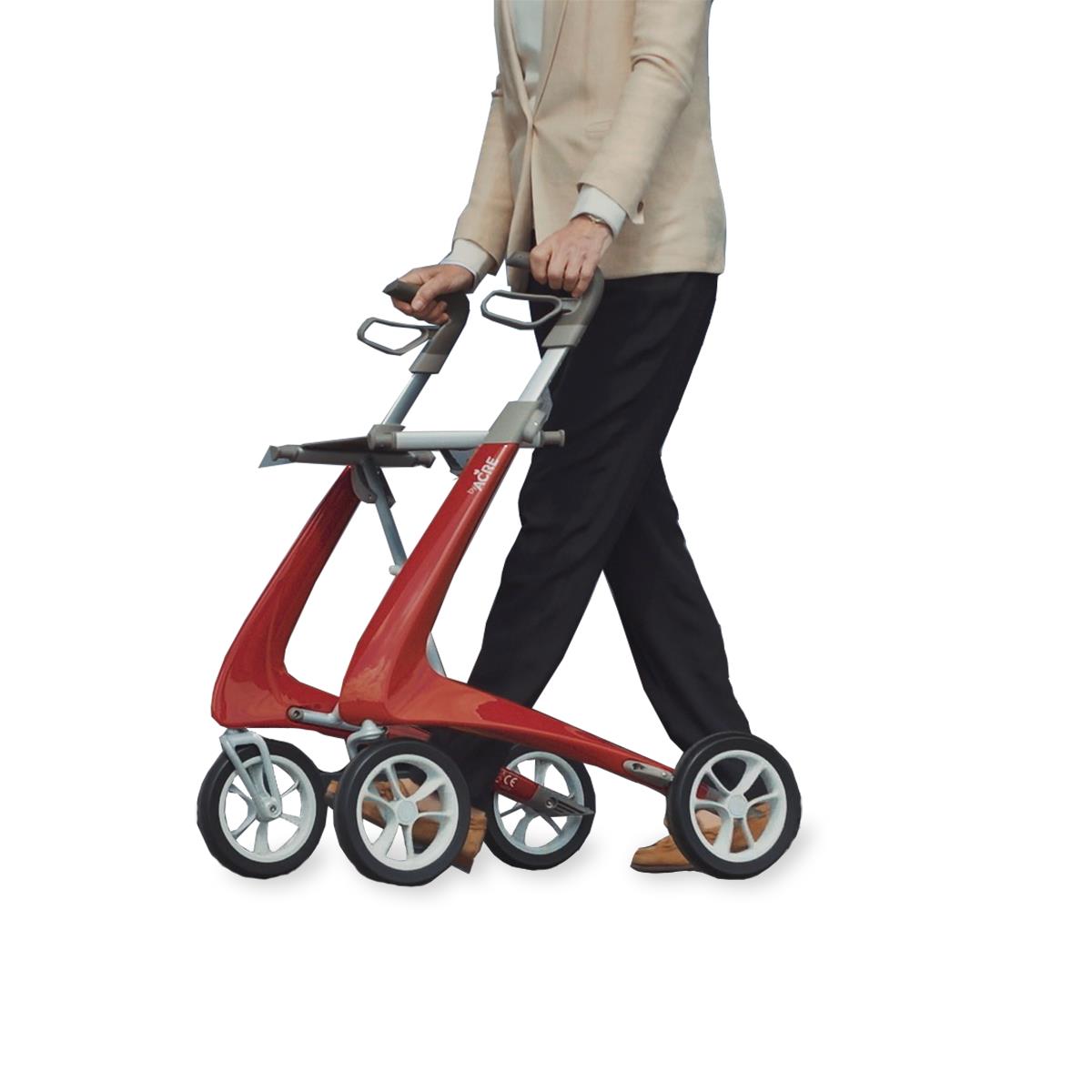Person walking with the byACRE Ultralight Carbon Fiber Rollator in red, demonstrating lightweight mobility support, available at Dahl Medical Supply.
